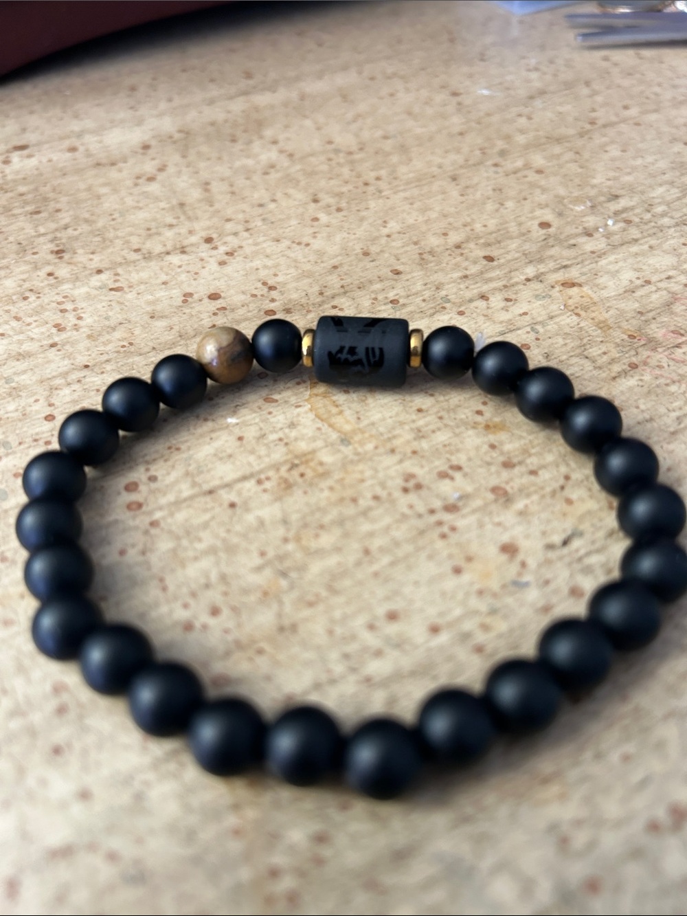 Matte Black Beaded Men's Stretch Bracelet with Brown Accent